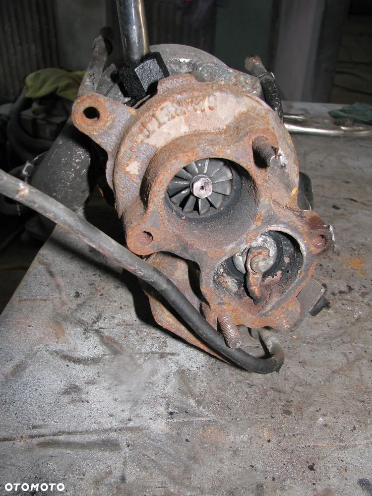 Turbosprężarka TURBO MITSUBISHI CARISMA VOLVO V40 1.9 TD 7700108864 - 2