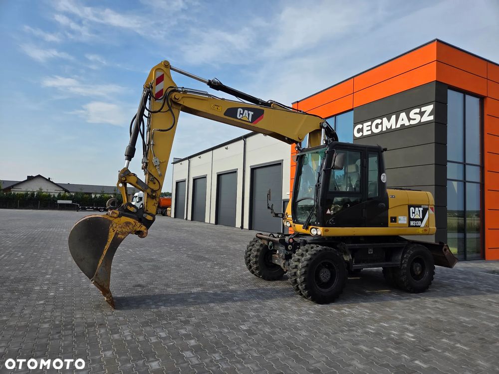 Caterpillar M313D / z Niemiec / - 1