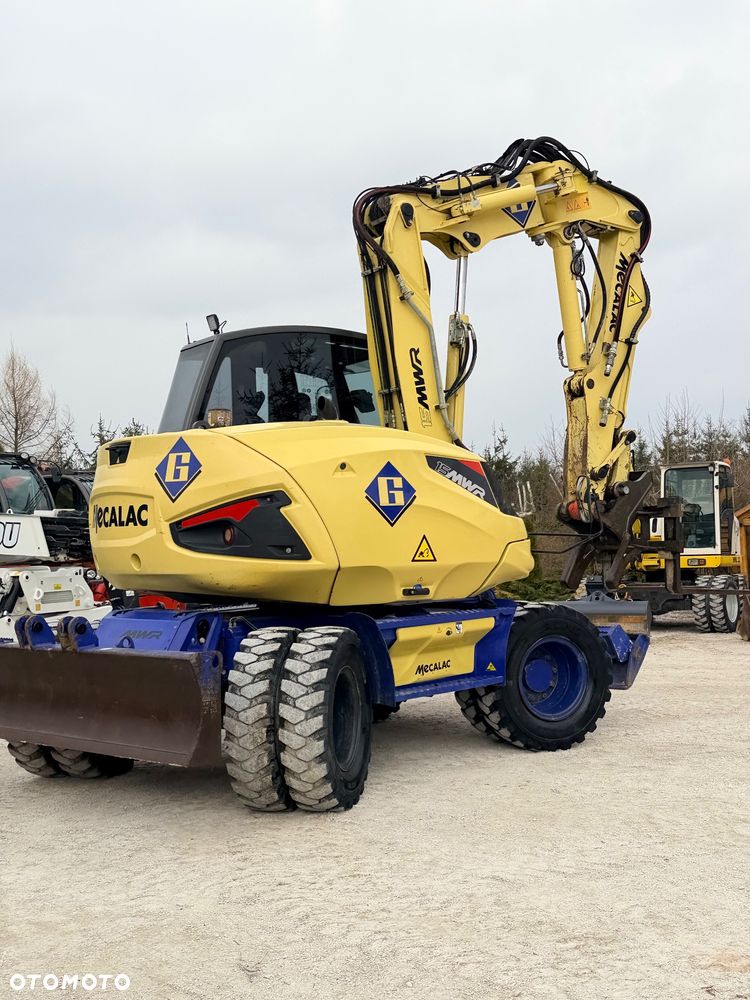Mecalac Koparka 14 ton MECALAC 15 MWR koparko-ładowarka 3 łyżki widły 1 wł Centr.smarowanie Opony na BLIŹNIAKU 80%Camso ładowarka 714 12MTX 4x4 skrętne KLIMA kabina Premium silnik 146KM volvo EW140B DEUTZ szybka 35km/h - 35