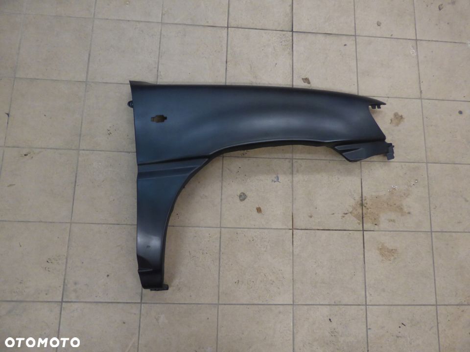 BŁOTNIK PRZÓD NISSAN TERRANO II LIFT 99-02 PRAWY - 1