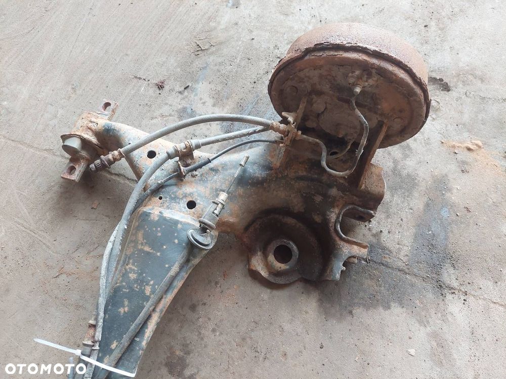 BELKA OŚ ZAWIESZENIA TYŁ BĘBNY Z ABS MITSUBISHI COLT VI ID: 238001 - 6