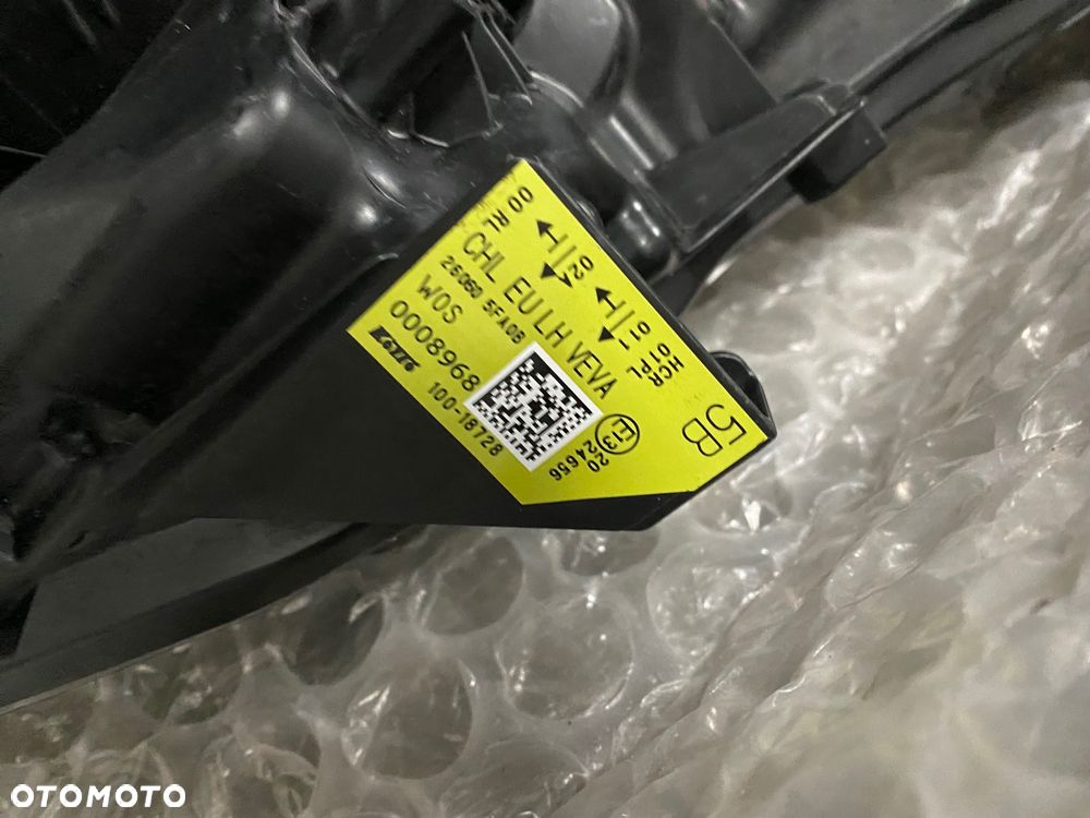 LAMPA LEWA ZWYKŁA CZARNA NISSAN MICRA K14 26060 5FA08 KOITO 100-18728 - 11