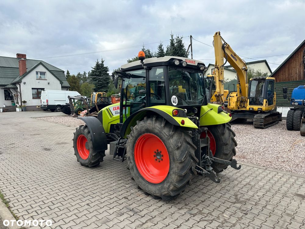 Claas Axos 320 - 2