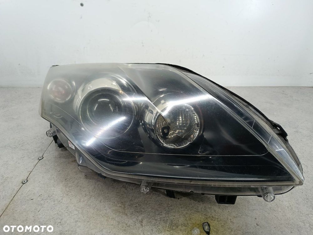 LAMPA PRZÓD PRAWA XENON RENAULT LAGUNA III 260100043R 89902279 89034934 - 6