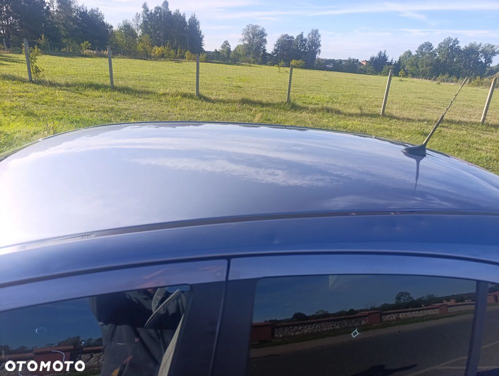 Opel Corsa 1.4 Cosmo - 12