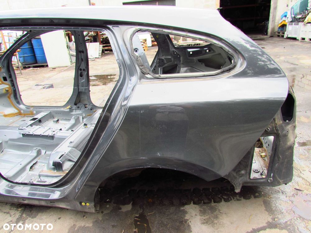 VOLVO V60 10-17 CWIARTKA BLOTNIK TYL POSZYCIE LEWE - 1
