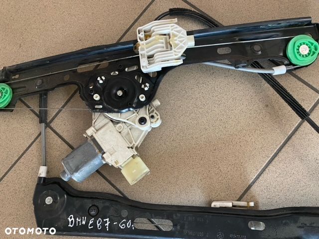 BMW E 87 podnośnik szyby prawy przód 6927028