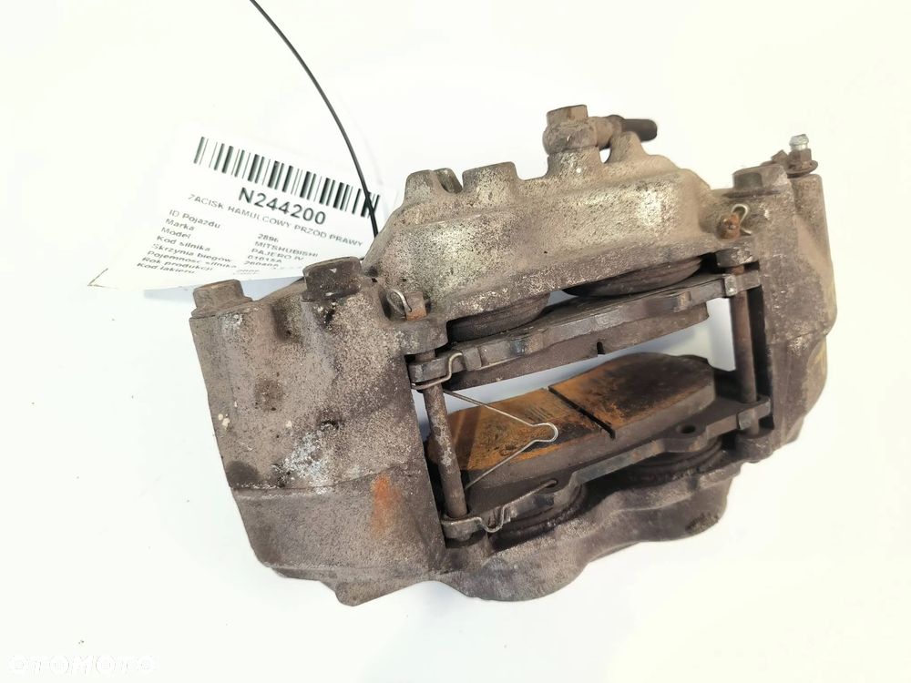 Zacisk hamulcowy prawy/lewy przód Mitsubishi Pajero 2008 SUV Diesel 147kW 3200cm³ - 1