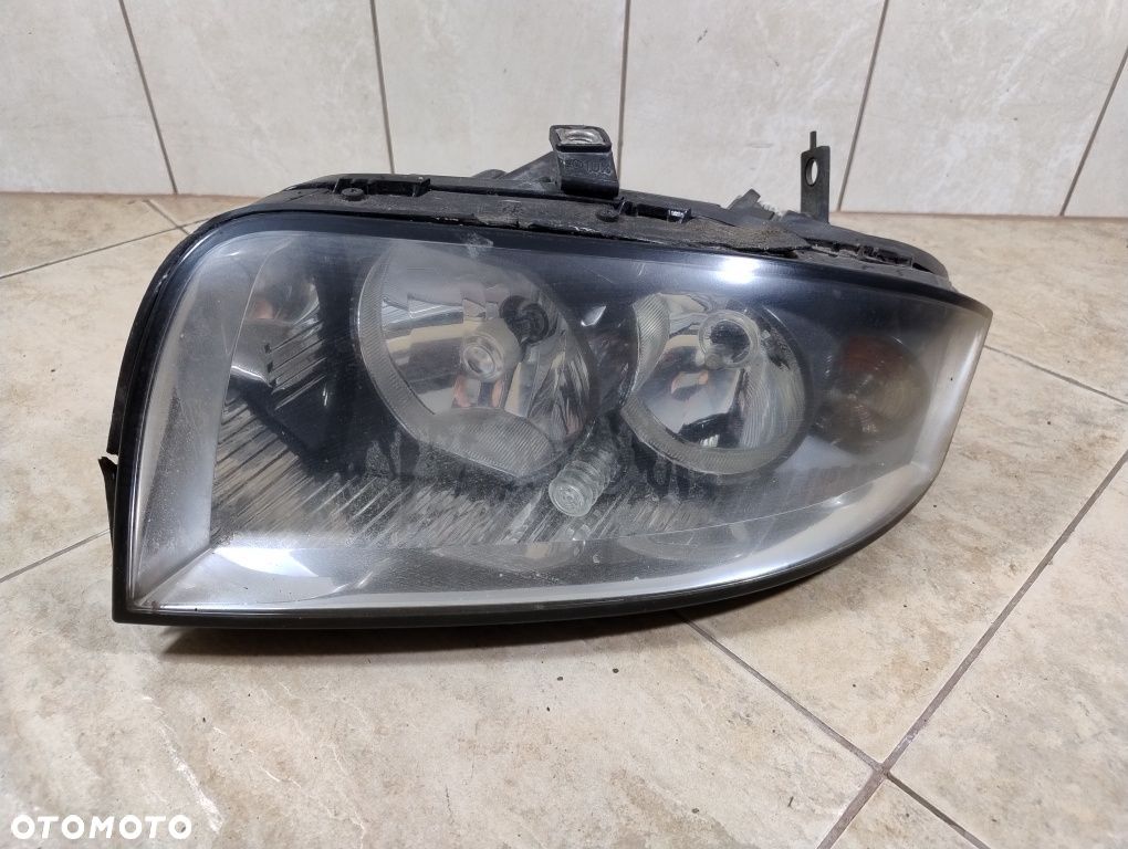 Audi a2 reflektor lampa lewa przód Europa oryginał wysyłka OLX - 1