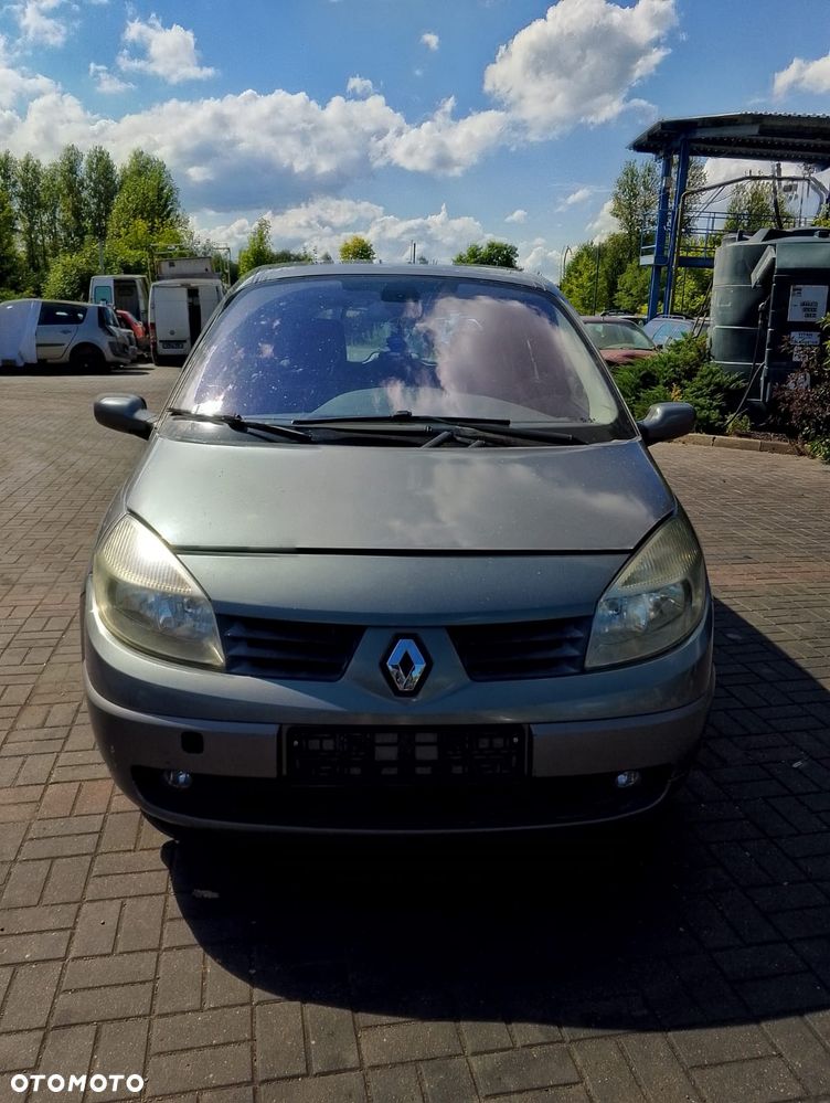 Renault Megane Scenic II (03-06r.) 1.5D 106KM. Silnik K9K 728 Skrzynia JR5 110 lakier NV603 (603).Cały na części. GWARANCJA !!! Przód Tył Zestaw Komplet Drzwi Klapa Zderzak Błotnik Maska Grill Atrapa Szyba Pas Lampa Lusterko Boczki Fotel Kanapa Kokpit Deska Rozdzielcza Przełącznik Włącznik Sterownik Przewody Wiązka Instalacja Moduł Komputer Czujnik Listwa Pompa Alternator Wtryski Głowica Rozrusznik Kompresor Sprzęgło Dwumas Silnik Skrzynia ABS Klimatyzacji Paliwa Wspomagania Kolektor Turbina Przepustnica Zawór Chłodnica Koło Hak Belka Sanki Zawieszenie Mcpherson Półoś Amortyzator Wydech Tłumik Zacisk Most - 2