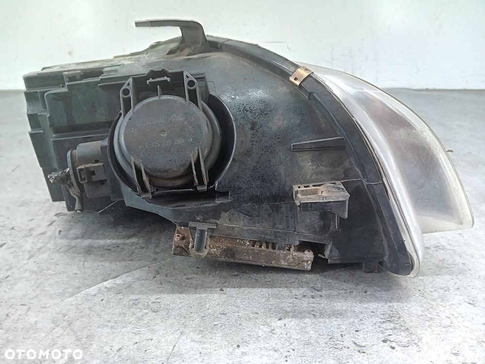 LAMPA PRZÓD LEWA XENON AUDI A4 B7 - 7