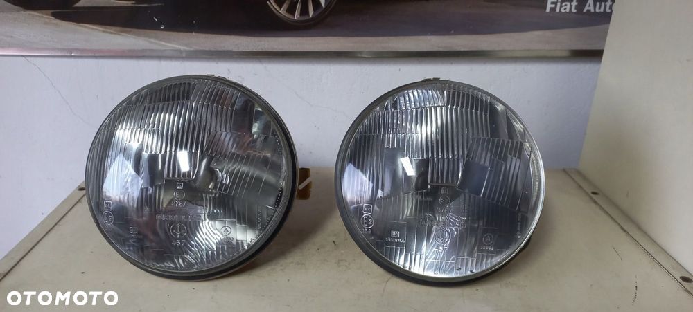 REFLEKTOR FIAT 128 RALLY H1 03653800 CARELLO 2 SZT NOWY