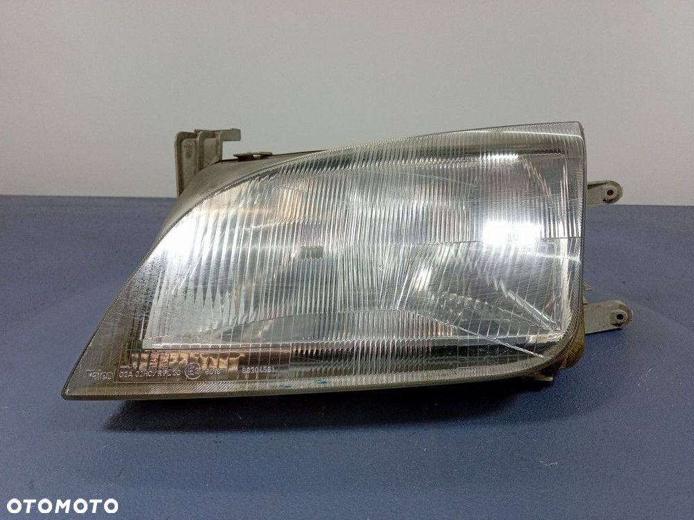 SUZUKI SWIFT III 96-04 REFLEKTOR LEWY EU 35300-80E - 1