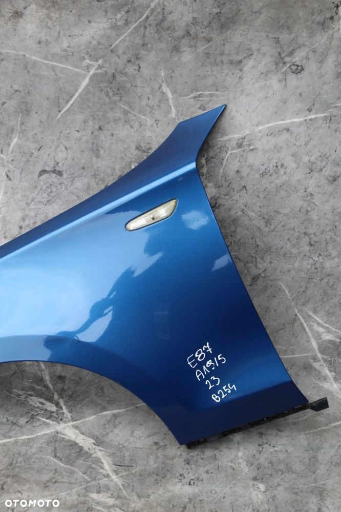 BŁOTNIK LEWY PRZÓD BMW E81 E82 E87 E88 A19 SYDNEYBLAU - 2