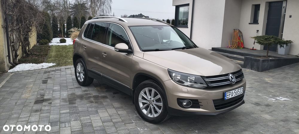 Volkswagen Tiguan 1.4 TSI 4Motion Exclusive - 1