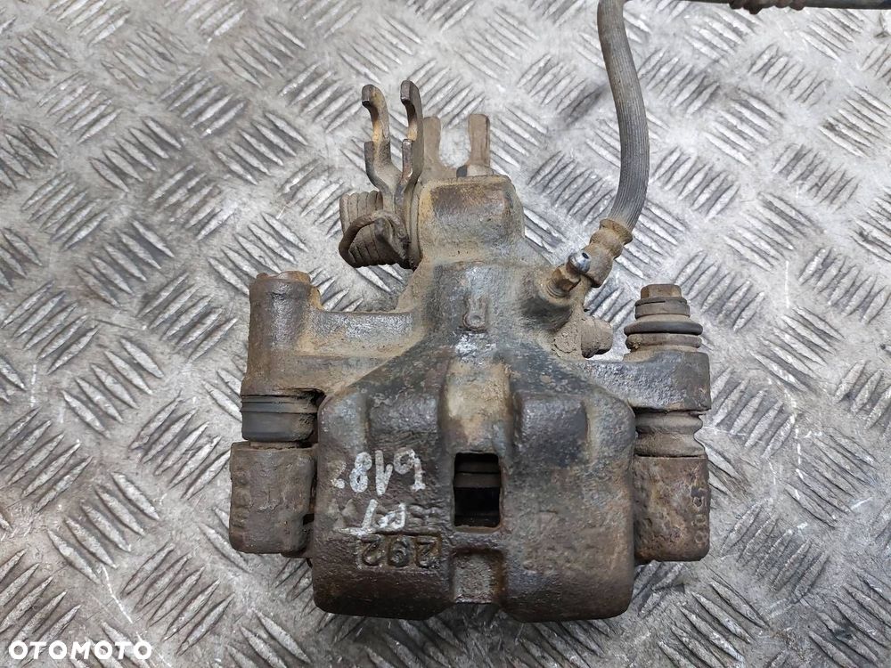 ZACISK HAMULCOWY PRAWY TYŁ MAZDA PREMACY I - 2