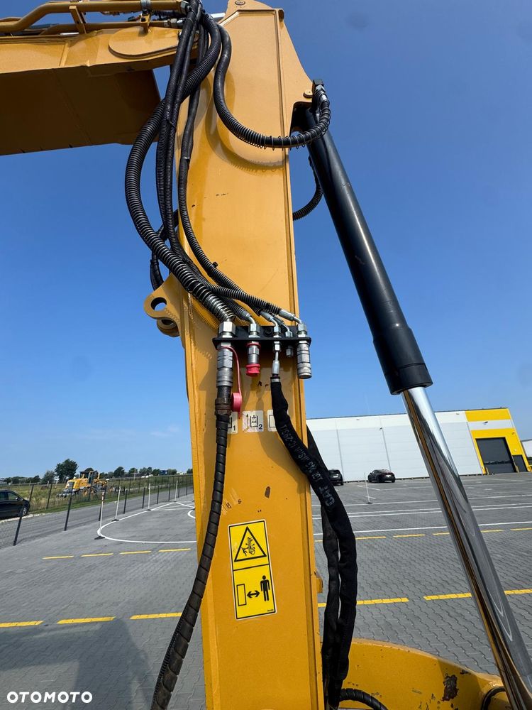 Caterpillar 310 - 14