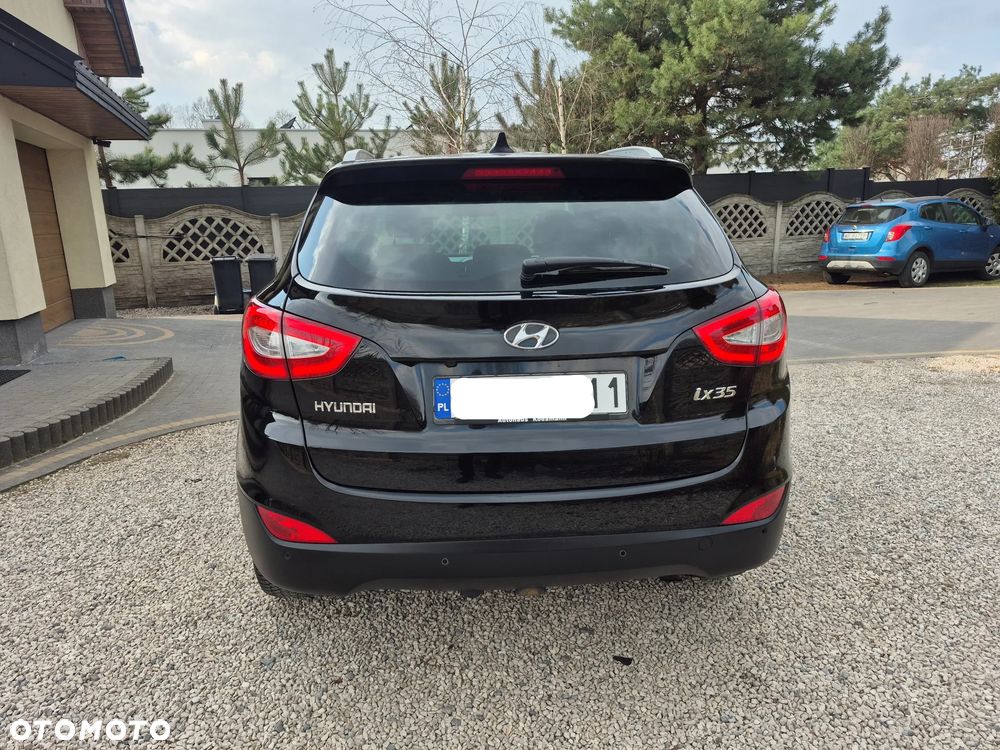 Hyundai ix35 blue 1.6 2WD Finale Gold - 13