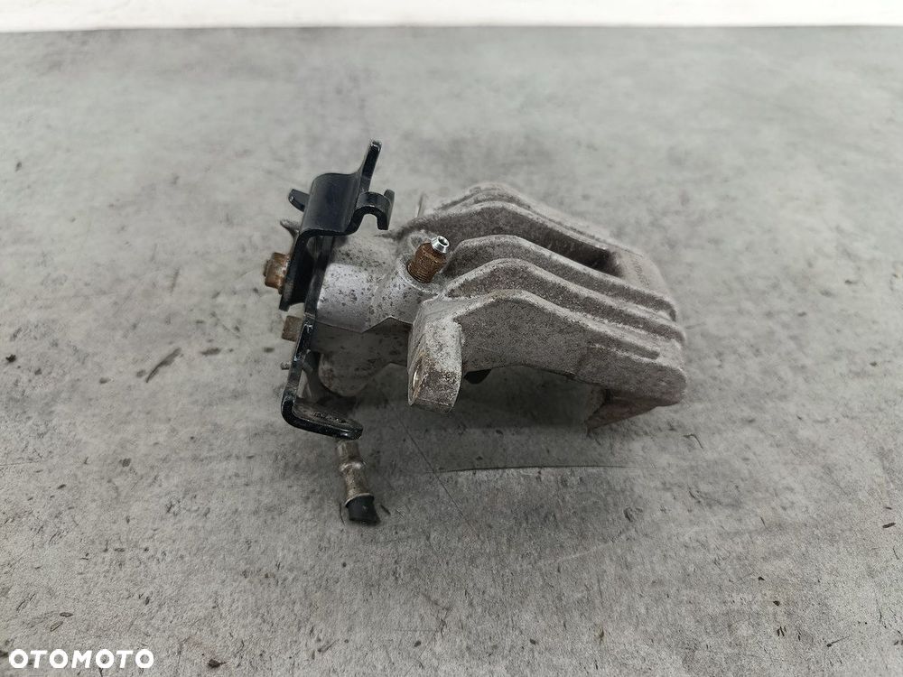 ZACISK HAMULCOWY LEWY TYŁ VW PASSAT B5 FL 1.9 TDI - 2