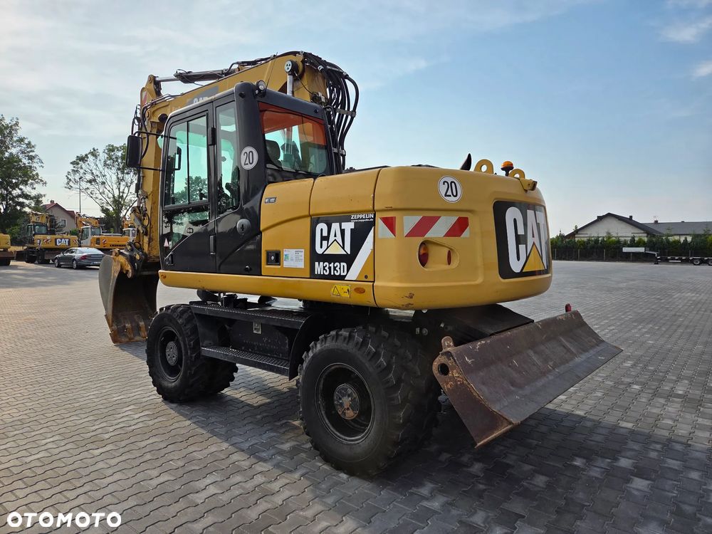 Caterpillar M313D / z Niemiec / - 3