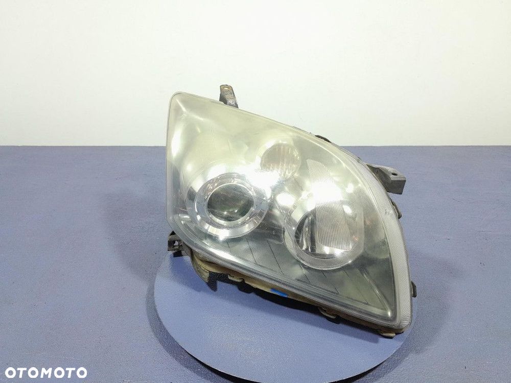 TOYOTA AVENSIS II T25 LIFT 06- REFLEKTOR PRAWY - 1
