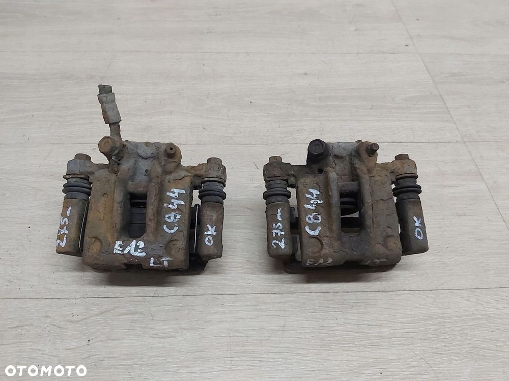 Toyota Corolla E12 zacisk jarzmo lewy tył 275mm - 2