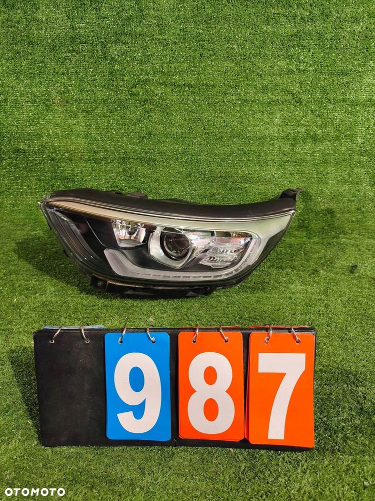 REFLEKTOR LEWY PRZÓD KIA STONIC 17- SOCZEWKA NR.987 - 1