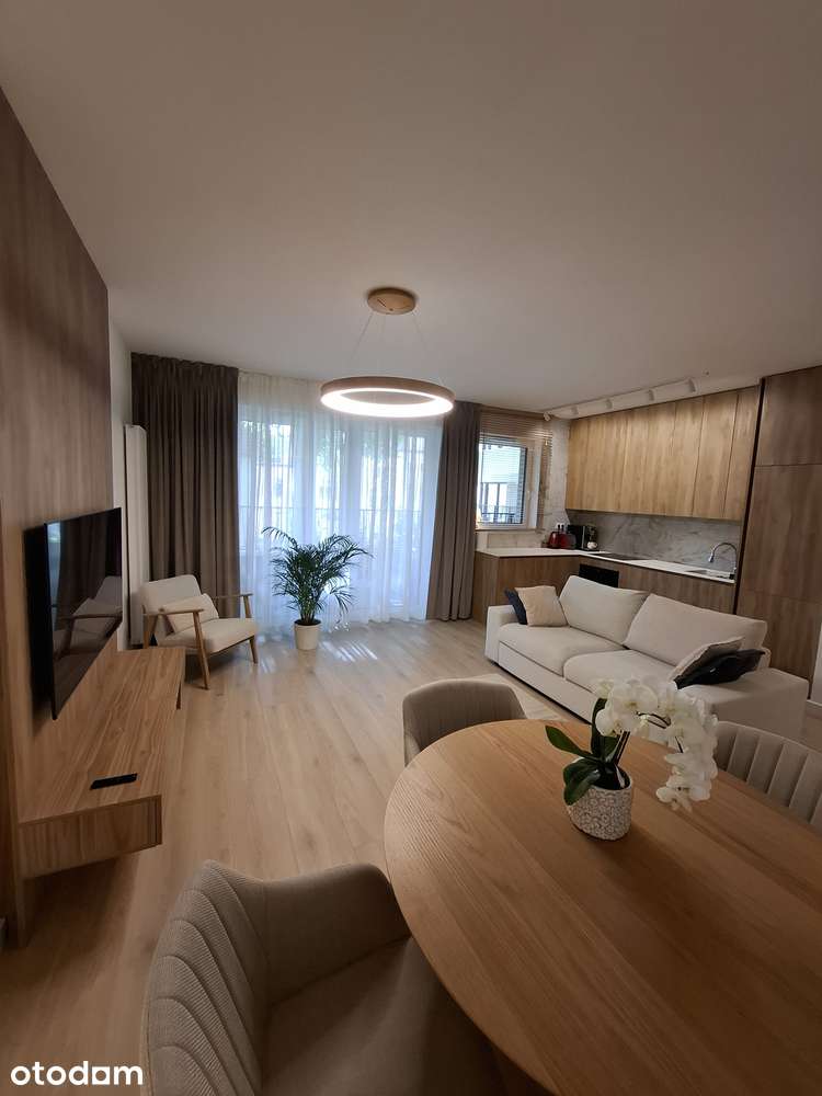 Mieszkanie w apartamentowcu z tarasem i ładowarką EV.