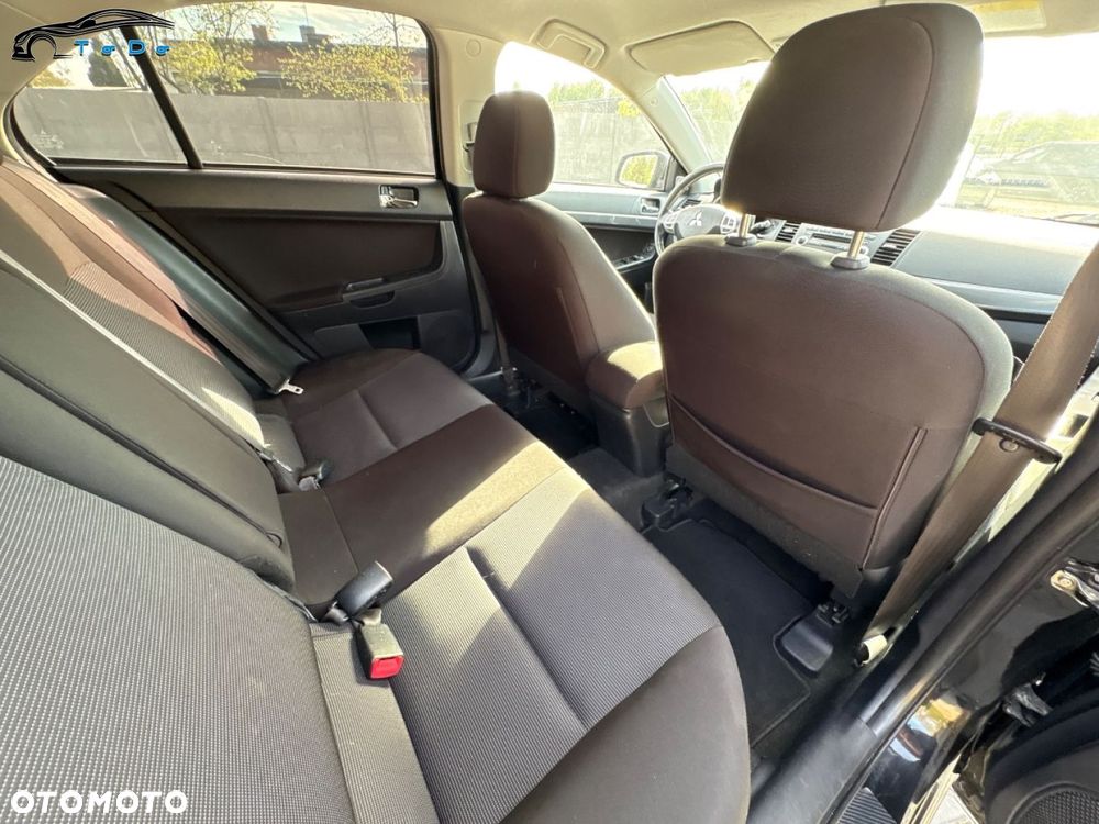 Mitsubishi Lancer 1.8 CVT Intense - 31