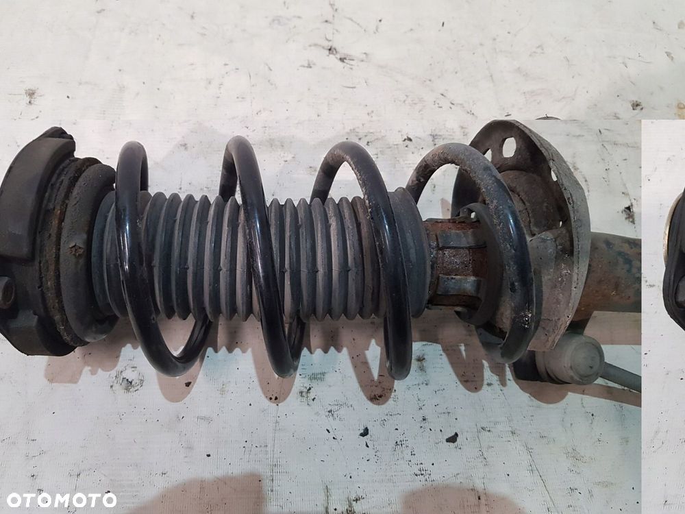 AMORTYZATOR SPRĘŻYNA PRAWY VW AUDI SKODA EU HB - 2