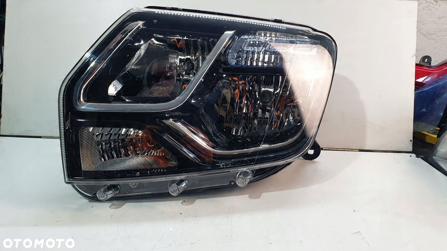 Dacia Duster 1 I Lift 13-17 prawa lampa przednia przód reflektor € - 5