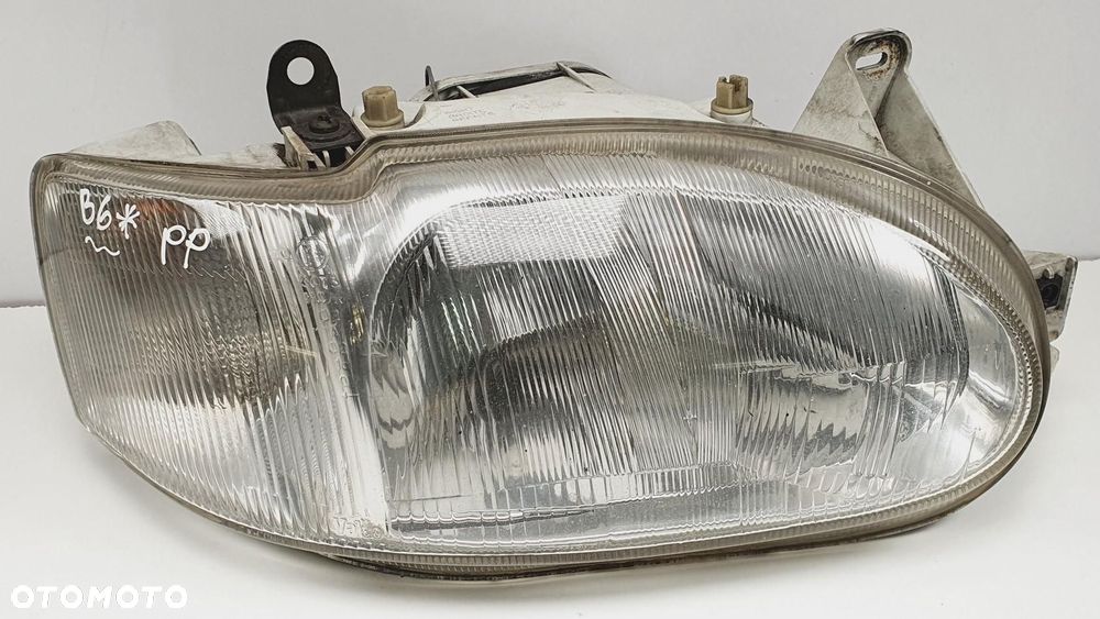 LAMPA PRAWA PRAWY PRZÓD FORD ESCORT MK7 EUROPA - 1