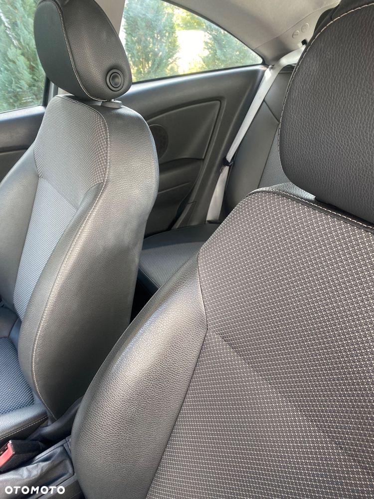 Opel Corsa 1.4 16V Cosmo - 12