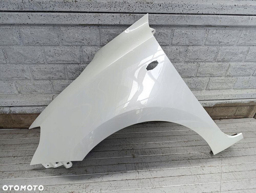 SUZUKI SWIFT MK8 17-23 BŁOTNIK PRZEDNI LEWY ORYGINAŁ - 1