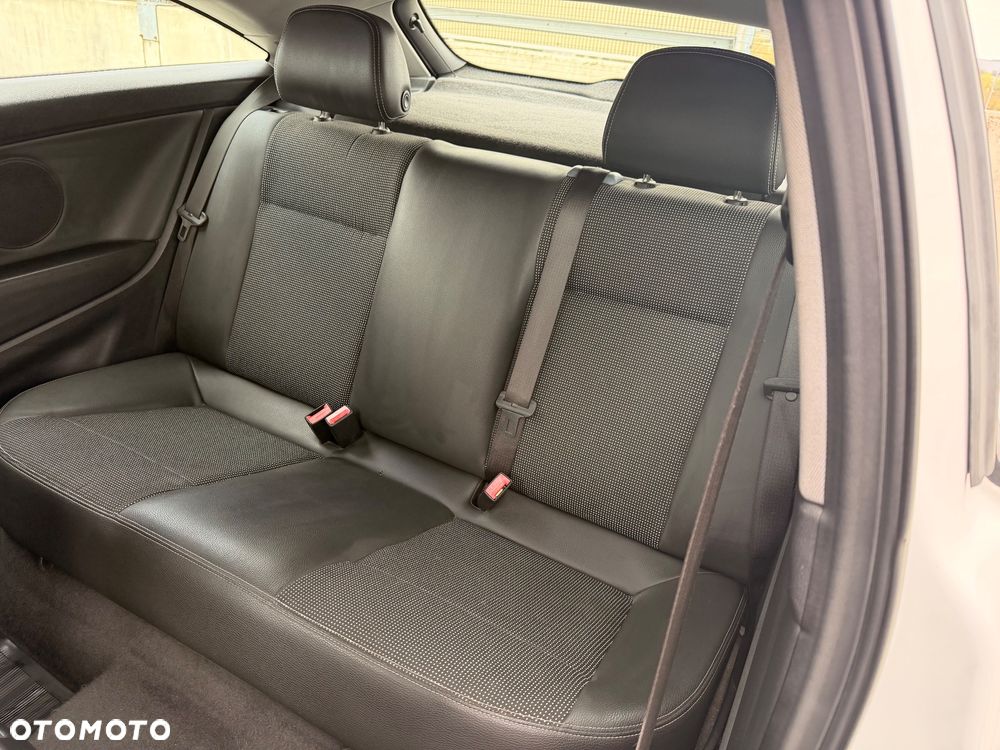 Opel Astra 1.8 Cosmo - 13
