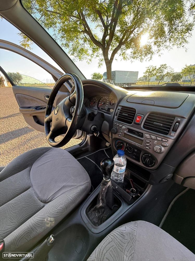 Nissan Almera 1.5 Comfort ABS+AC - 31