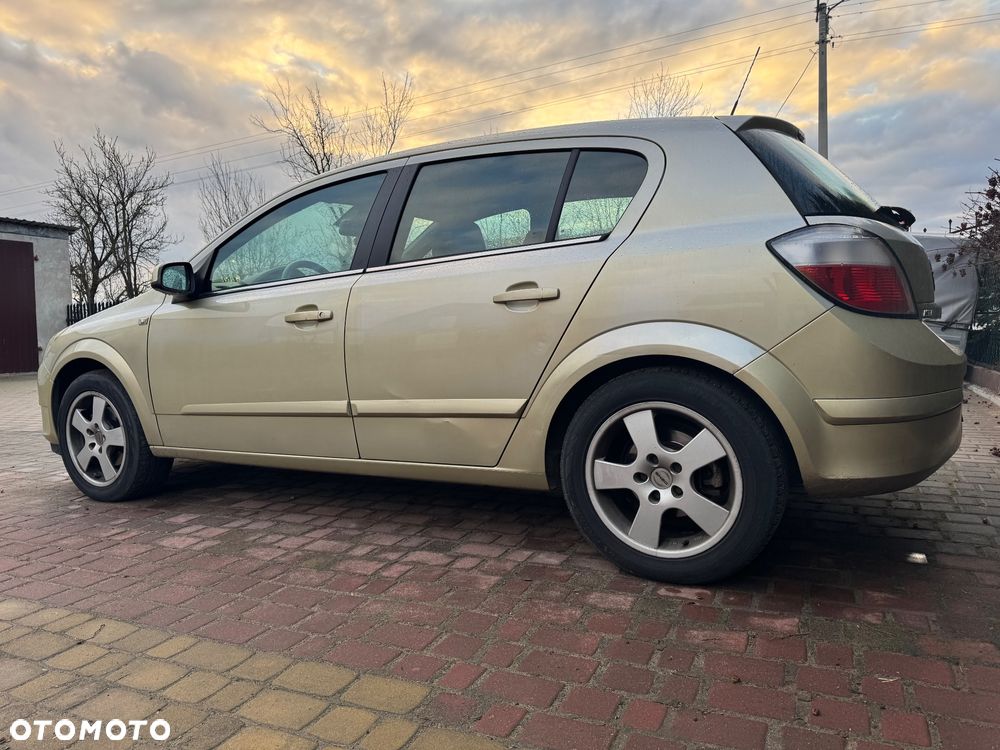 Opel Astra ver-iii-1-7-cdti - 12