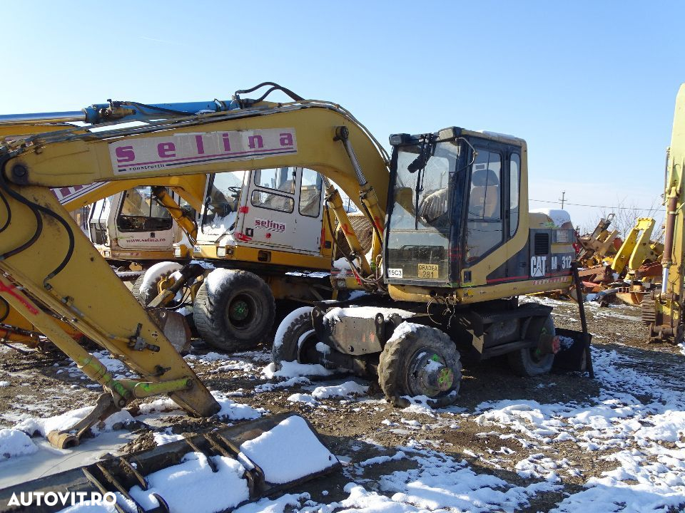 Excavator CAT 312 M,piese - 4