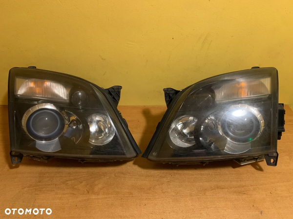 OPEL VECTRA C LAMPA PRAWA LEWA BIXENON 159872-00