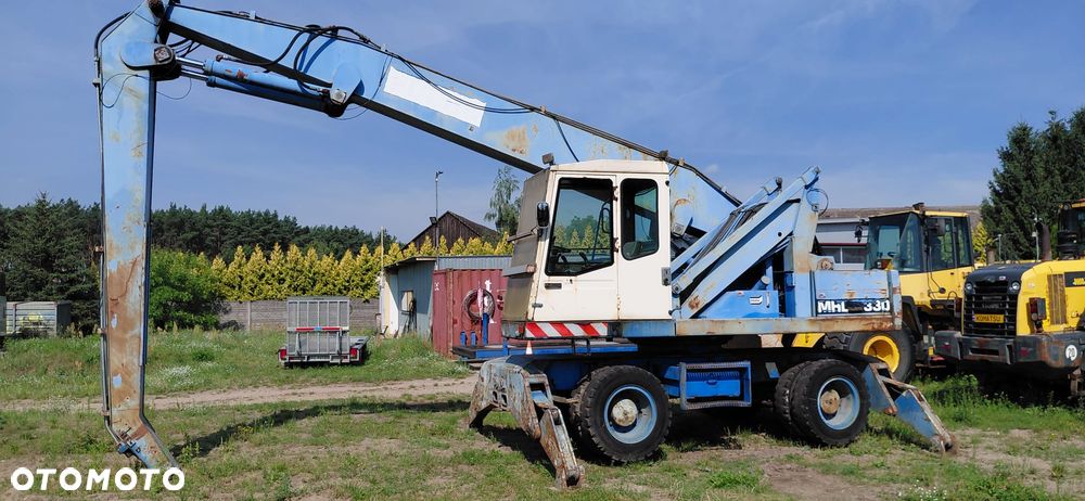 Fuchs 330 (1996r) 320 MHL 331 Fuchs 714 - 1