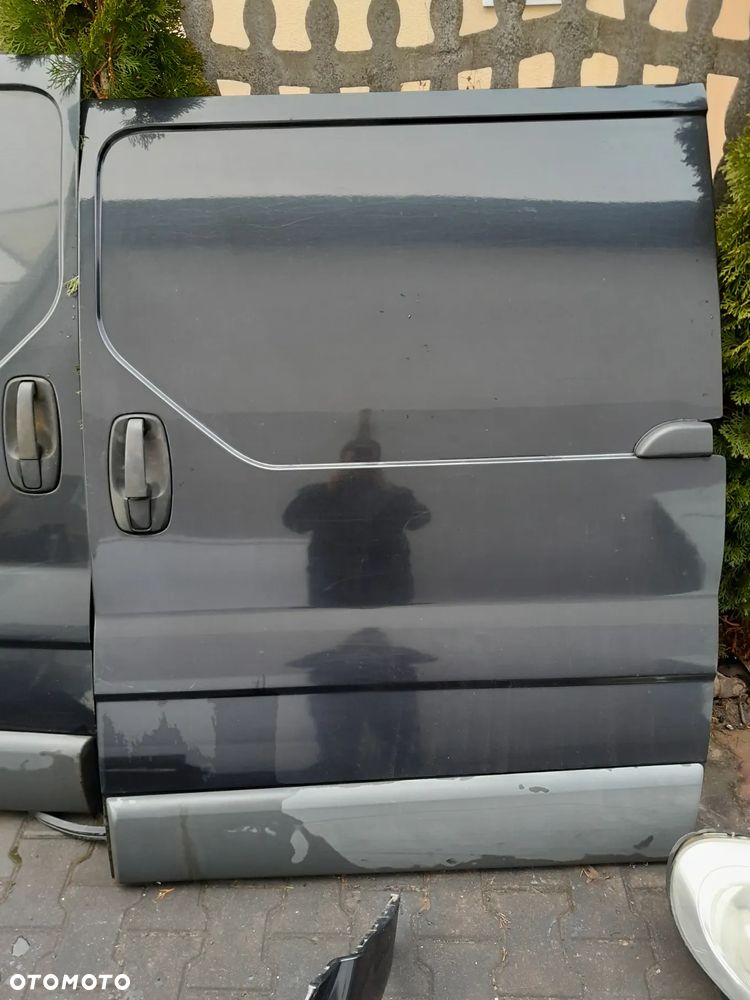Drzwi lewe boczne Opel Vivaro 08r - 1