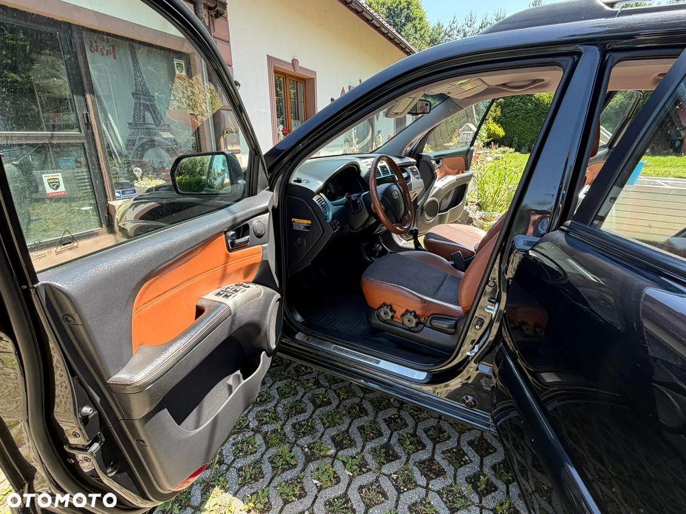 Kia Sportage 2.0 Tour - 7