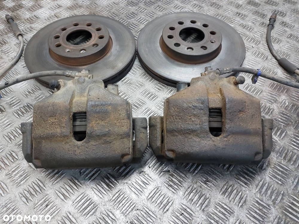 TARCZE HAMULCOWE PRZÓD + KLOCKI + ZACISKI SEAT LEON II 2.0 TDI - 2