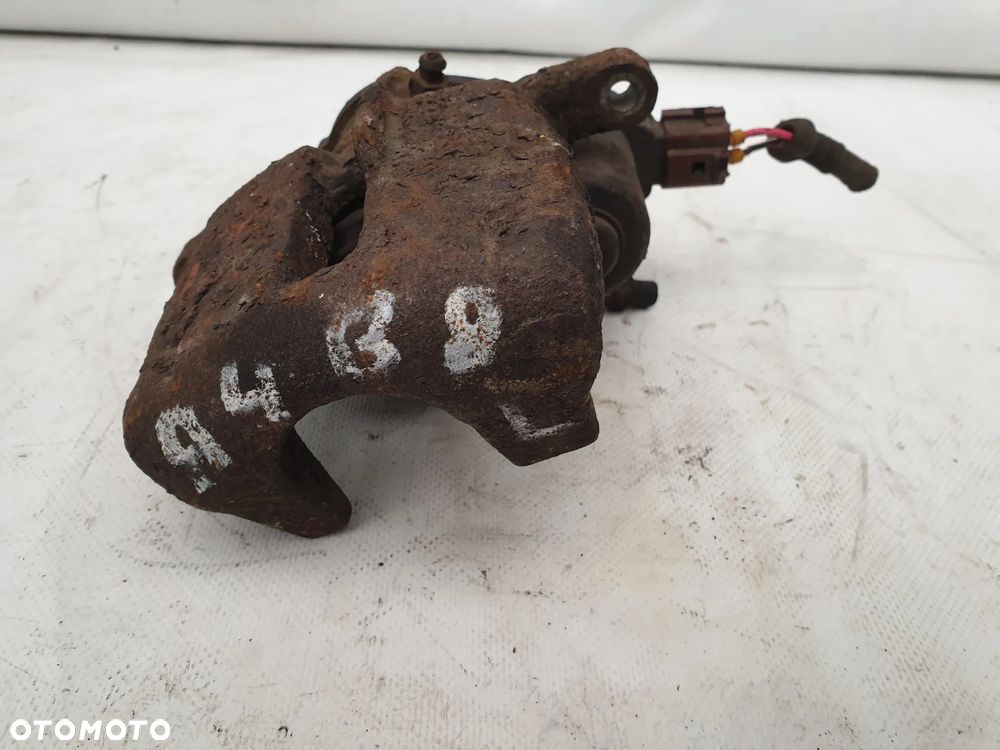 Audi A4 B8 Zacisk Elektryczny Lewy Tył