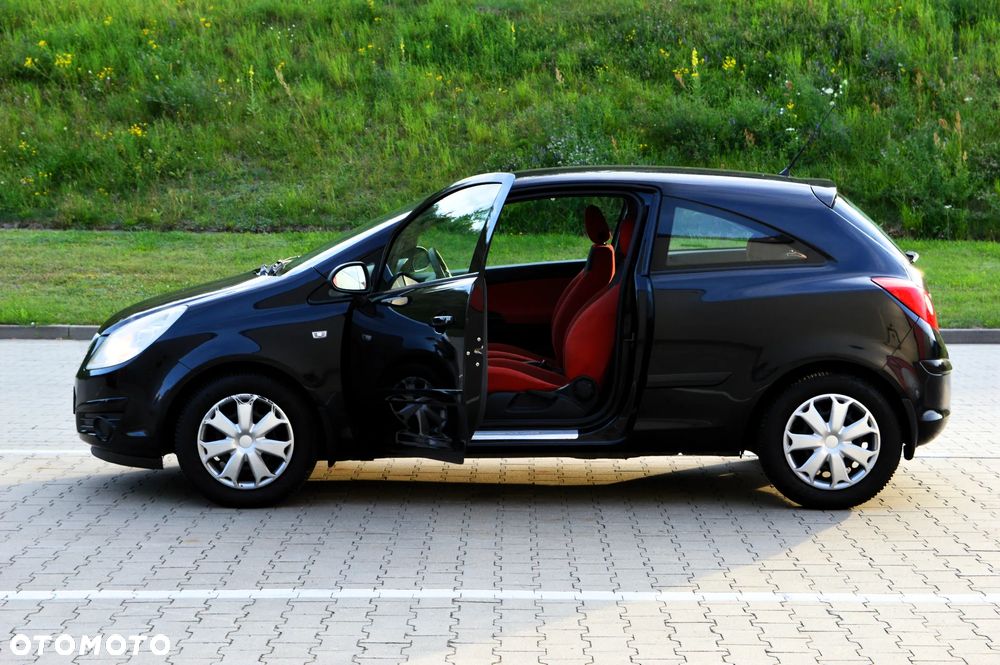 Opel Corsa 1.4 16V Cosmo - 26