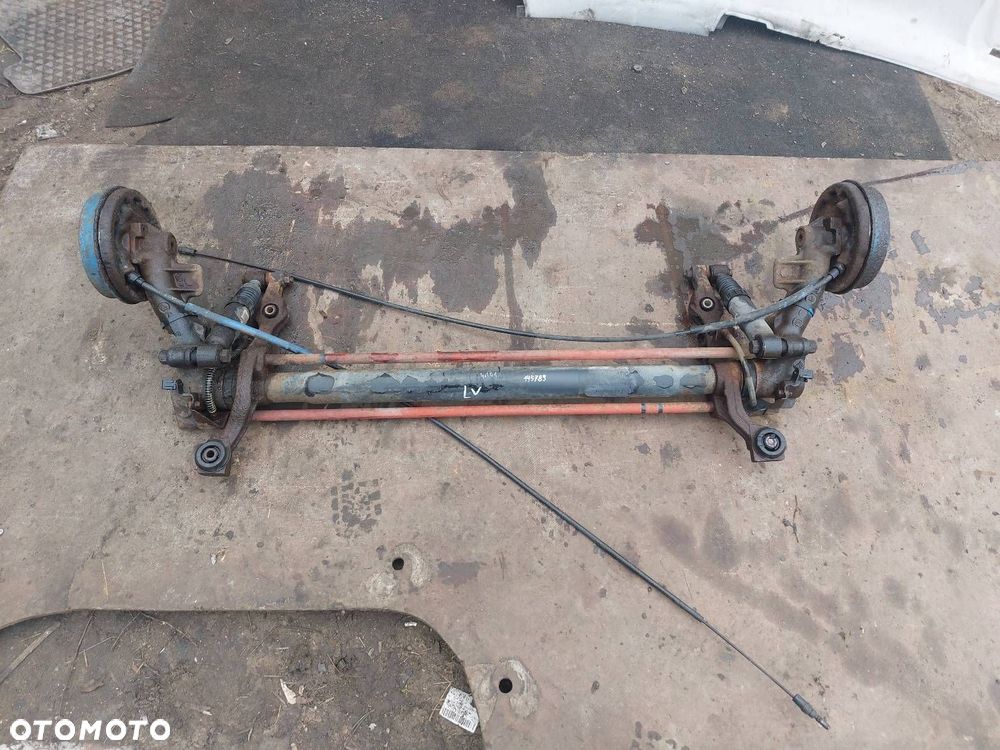 BELKA OŚ ZAWIESZENIA TYŁ  PEUGEOT 106 I 91-96r BĘBNY - 1