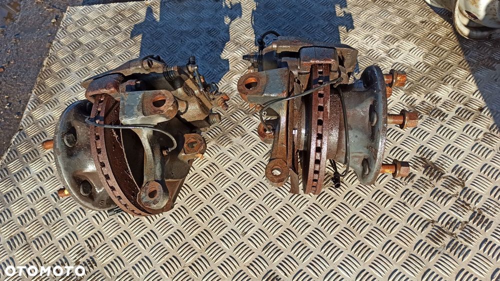 zacisk prawy przód iveco 65c 70c bliźniak 14r jarzmo - 10