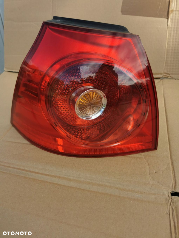 Lampa lewa tylna VW Golf V HB 1K6945095E
