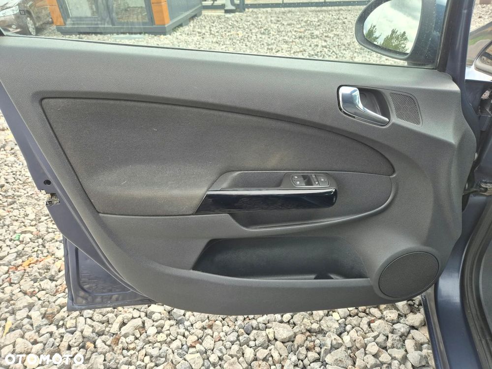 Opel Corsa 1.4 16V Enjoy - 12