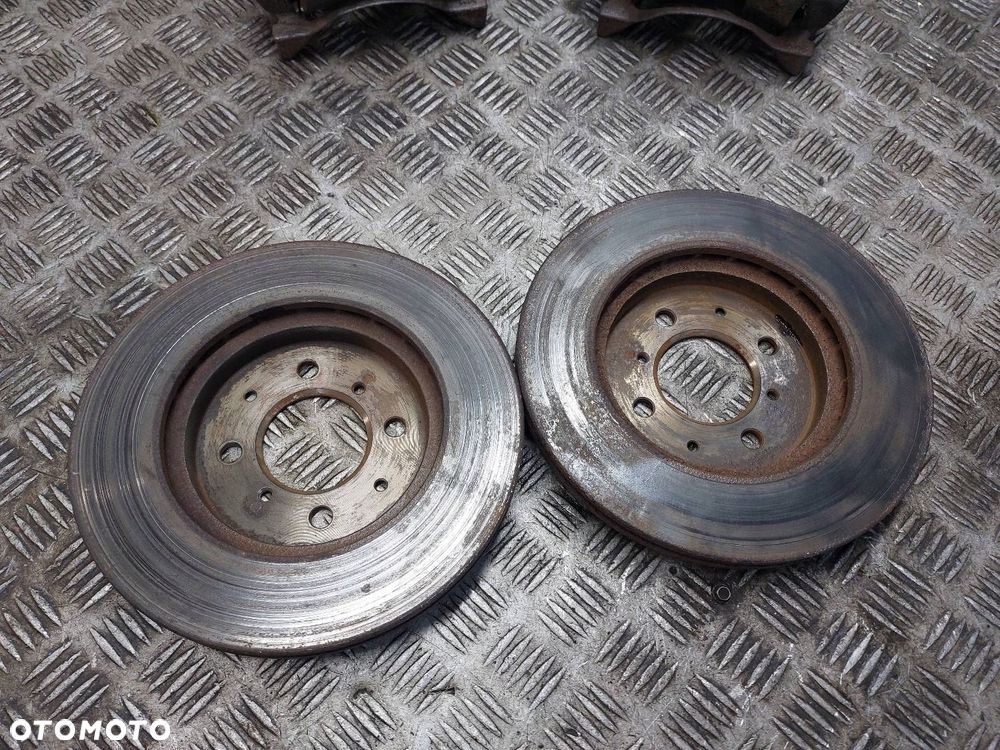 TARCZE HAMULCOWE PRZÓD + KLOCKI + ZACISKI HONDA CITY IV 1.4 16V - 2